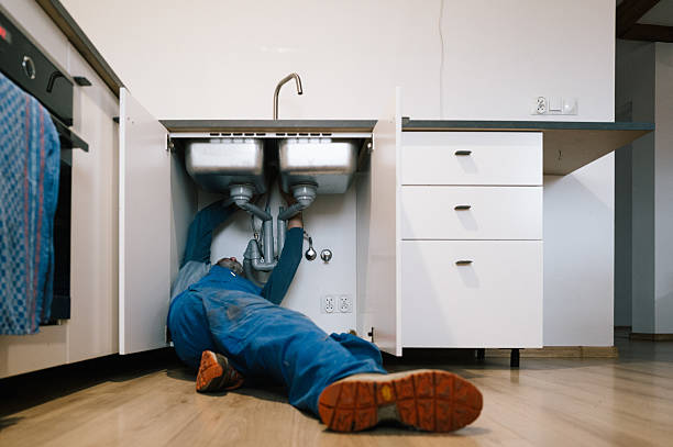 Professional Drain Cleaning technician working in Valley, WA